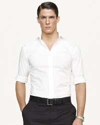 A classic sport shirt is expertly tailored for a trim, modern fit and handsomely rendered in smooth cotton poplin with a hint of stretch for sleek, stylish comfort. A classic sport shirt is expertly tailored for a trim, modern fit and handsomely rendered in smooth cotton poplin with a hint of stretch for sleek, stylish comfort.