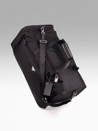 Black nylon with saffiano leather trim rolling duffel with pull-out handle and nylon shoulder strap. Lined with PRADA jacquard fabric 11½H X 21½L X 11¾W Made in Italy Black nylon with saffiano leather trim rolling duffel with pull-out handle and nylon shoulder strap. Lined with PRADA jacquard fabric 11½H X 21½L X 11¾W Made in Italy