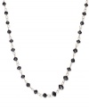 An elegant combination. Faceted black diamond beads (7 ct. t.w.) enhance the appeal of this link necklace, set in 14k gold. Approximate length: 17 inches.