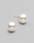 Simple and lovely, classic studs of lustrous white pearls to wear anywhere. 12mm organic man-made pearls 14k gold 14k gold post back Made in Spain