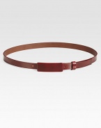 This thin leather style is finished with a small covered buckle tab.About 1 wideMade in Italy