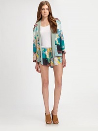 An effortless, open-front topper of airy chiffon, highlighted in a vibrant, photo-realistic print.Foldover lapelDropped shouldersThree-quarter sleevesOpen frontSlash pocketsAbout 27 from shoulder to hemPolyesterDry cleanMade in USA of imported fabricModel shown is 5'11 (180cm) wearing US size Small. An effortless, open-front topper of airy chiffon, highlighted in a vibrant, photo-realistic print.Foldover lapelDropped shouldersThree-quarter sleevesOpen frontSlash pocketsAbout 27 from shoulder to hemPolyesterDry cleanMade in USA of imported fabricModel shown is 5'11 (180cm) wearing US size Small.