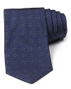 With a subtle dot pattern and rich color, this soft silk tie from BOSS Black gives your polished look a bit of designer flair.