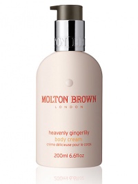 Our Heavenly Gingerlily Body Cream is a true original product in every way, using the finest essential oils and active extracts, it bring the flavors and aromas of the Polynesian islands to life. The indulgent body lotion will leave your skin not only feeling hydrated and moisturized, but mica extract leaves the skin with a sheen of shimmer which is visible after application. Perfect for holiday or going out. Made in England. 6.6 oz.