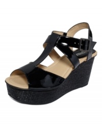 Opposites attract. A high-shine patent finish and woven wedge make the perfect pairing on the Wind Me Up sandals from Kenneth Cole Reaction. Opposites attract. A high-shine patent finish and woven wedge make the perfect pairing on the Wind Me Up sandals from Kenneth Cole Reaction.