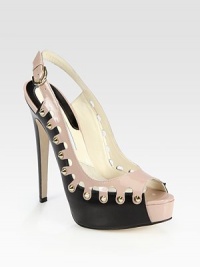 Timeless velukid leather silhouette modernized by bronzed grommets and an adjustable, contrasting patent leather slingback. Self-covered heel, 5 (125mm)Covered platform, 2 (50mm)Compares to a 3 heel (75mm)Leather and patent leather upperLeather lining and solePadded insoleMade in ItalyOUR FIT MODEL RECOMMENDS ordering one half size up as this style runs small. Timeless velukid leather silhouette modernized by bronzed grommets and an adjustable, contrasting patent leather slingback. Self-covered heel, 5 (125mm)Covered platform, 2 (50mm)Compares to a 3 heel (75mm)Leather and patent leather upperLeather lining and solePadded insoleMade in ItalyOUR FIT MODEL RECOMMENDS ordering one half size up as this style runs small.