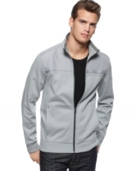 Add a but of sport to your layered look with this sleek lightweight track jacket from Calvin Klein. Add a but of sport to your layered look with this sleek lightweight track jacket from Calvin Klein.