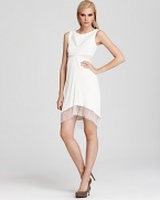 This curve-defining BCBGMAXAZRIA dress flaunts lace insets for a romantic finish.