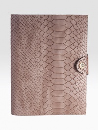 This python-embossed, leather-bound notebook with a snap-tab closure is perfect for everyday note-taking, list-making or journal-writing.LeatherIncludes 176 perforated, lined pagesAbout 5.5 X 7.5Made in USA This python-embossed, leather-bound notebook with a snap-tab closure is perfect for everyday note-taking, list-making or journal-writing.LeatherIncludes 176 perforated, lined pagesAbout 5.5 X 7.5Made in USA