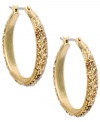 Take a fashionable step forward. Crystal pave accents captivate on these Jones New York hoop earrings. Crafted in gold tone mixed metal. Approximate drop: 2-1/2 inches. Approximate diameter: 1-1/2 inches.
