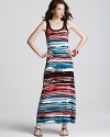 Move to the fashion beat in this Karen Karen maxi dress. A vibrant melody of hues lends colorful rhythm to your look.