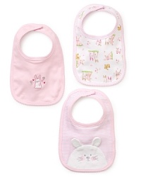 This set of bunny bibs includes one with velour bunny embroidery, one with a bunny print and one solid with single bunny. This set of bunny bibs includes one with velour bunny embroidery, one with a bunny print and one solid with single bunny.