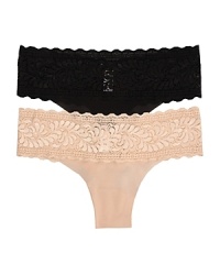 A lightweight thong with floral mesh panels and no elastic for a barely there style. Style #LIITA0321 A lightweight thong with floral mesh panels and no elastic for a barely there style. Style #LIITA0321