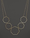 A modern statement necklace in yellow gold from Lana.