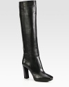 Tall leather silhouette with a square toe, stacked platform heel and side zip. Self-covered heel, 4 (100mm)Self-covered platform, ½ (15mm)Compares to a 3½ heel, (90mm)Shaft, 17Leg circumference, 14½Leather upperSide zipLeather liningRubber solePadded insoleMade in Italy