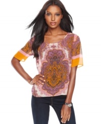 An exotic print lets bold hues stand out! INC's petite top can be styled casually or dressed up depending on your mood. An exotic print lets bold hues stand out! INC's petite top can be styled casually or dressed up depending on your mood.