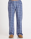 A stylish woven cotton pant for lounging or bedtime in a bold check pattern.Elastic waistCovered placket button-flySide slash pocketsInseam, about 32CottonMachine washImported