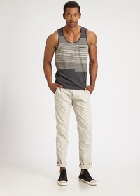 A basic striped tank gets an innovative update with engineered stripes and a simple patch pocket, in a soft poly cotton blend.Scoop neckChest patch pocket50% polyester/38% cotton/12% modalMachine washImported