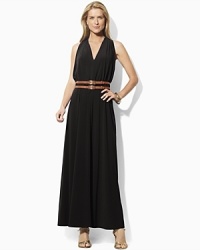 Crafted in sleek matte jersey, a flowing maxi dress is designed with a chic cutaway shoulder and belted waist for a figure-flattering look. Crafted in sleek matte jersey, a flowing maxi dress is designed with a chic cutaway shoulder and belted waist for a figure-flattering look.