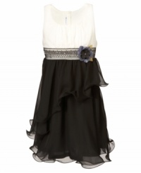 Ornate and adorable. Beautiful floral and ribbon detailing on this ruffle dress from Bonnie Jean are beautiful accents that will bring a sparkle to her eye. Ornate and adorable. Beautiful floral and ribbon detailing on this ruffle dress from Bonnie Jean are beautiful accents that will bring a sparkle to her eye.