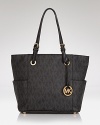 With its sleek shape and gorgeous craftsmanship, this MICHAEL Michael Kors tote is an It bag with ever-chic allure.