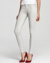 Metallic-coated J Brand skinny jeans strut into the new season with trendsetting shine in a casual low-rise silhouette.