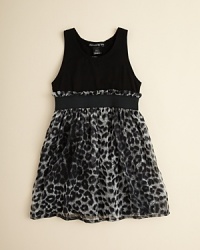 This well-appointed look contrasts a solid bodice and belt with tonal leopard print to lovely effect. This well-appointed look contrasts a solid bodice and belt with tonal leopard print to lovely effect.