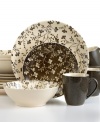 Allover blooms rooted in vintage charm conceal the hardy stoneware of Fresh Flowers dinnerware from Sango. With simple coupe bowls and plates, plus mugs to match in a mottled black.