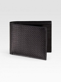 Sleek, slim design rendered in stamped calfskin leather.One billfold compartmentSix credit card slots4½ x 3¼Made in Italy Sleek, slim design rendered in stamped calfskin leather.One billfold compartmentSix credit card slots4½ x 3¼Made in Italy