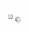Traditional diamond stud earrings with an intricate twist. Each pair features a bezel-set diamond in the side, as well as a round-cut diamond at front (total 1/2 ct. t.w.). Set in 14k white gold. Approximate diameter: 4-1/10 mm.