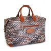 A gorgeous Missoni design adorns this beautiful duffel from Bric's.