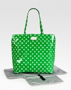 A mod, polka dot baby bag with matching changing pad for the stylish and sophisticated mom on-the-go.Double top handles, approximately 10 dropSpring clip strap top closeOne inside open pocketOne inside zip pocketWipe-clean liningPoplin-backed nylonApproximately 13½W X 12H X 10DImported