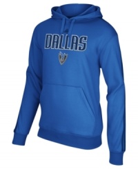 Showcase your winning team while keeping warm in this NBA Dallas Mavericks hoodie by adidas. Showcase your winning team while keeping warm in this NBA Dallas Mavericks hoodie by adidas.