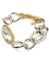 Add a little nautical inspiration! Kenneth Cole New York's rope-style stretch bracelet incorporates silver and gold tone chains with geometrical glass, glass faceted beads, and silver cherry beads. Bracelet stretches to fit wrist. Approximate length: 7-1/2 inches.