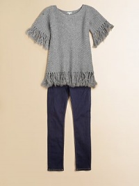 A fun tangle of fringe edges the sleeves and hem of a richly textured tunic in a pretty basketweave stitch.Scoop necklineShort sleeves with long knotted fringeStraight shapeTunic lengthFringed hem40% wool/30% viscose/15% nylon/10% angora/5% cashmereHand washImported A fun tangle of fringe edges the sleeves and hem of a richly textured tunic in a pretty basketweave stitch.Scoop necklineShort sleeves with long knotted fringeStraight shapeTunic lengthFringed hem40% wool/30% viscose/15% nylon/10% angora/5% cashmereHand washImported