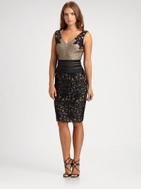 Lace appliqués and a matching skirt dress up this shimmering design.V necklineSleevelessSequined bodiceBanded waistLace appliqués and skirtBack ventV back with concealed zipFully linedAbout 22 from natural waistPolyesterDry cleanImportedModel shown is 5'10 (177cm) wearing US size 4. Lace appliqués and a matching skirt dress up this shimmering design.V necklineSleevelessSequined bodiceBanded waistLace appliqués and skirtBack ventV back with concealed zipFully linedAbout 22 from natural waistPolyesterDry cleanImportedModel shown is 5'10 (177cm) wearing US size 4.