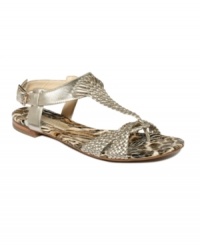 Take a walk on the wild side in these Triton flat sandals by Enzo Angiolini. Animal print across the sole and woven uppers create chic appeal while the ankle strap allows for easy entry. Take a walk on the wild side in these Triton flat sandals by Enzo Angiolini. Animal print across the sole and woven uppers create chic appeal while the ankle strap allows for easy entry.
