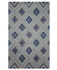 An ultra-mod diamond design is infused with classic color upon this stylish Kallia area rug from Liora Manne. Neutral and cool tones make this design accessible to any room décor and its hand-tufted detailing makes it durable enough to withstand heavy traffic, indoors or out. An ultra-mod diamond design is infused with classic color upon this stylish Kallia area rug from Liora Manne. Neutral and cool tones make this design accessible to any room décor and its hand-tufted detailing makes it durable enough to withstand heavy traffic, indoors or out.