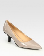 Glossy patent leather forms this timeless point toe silhouette fit for a lady. Stacked heel, 2½ (65mm)Patent leather upperPoint toeLeather liningRubber solePadded insoleMade in Italy