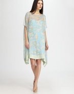 An ultra-mod sheath of graphic matte silk drapes elegantly from shoulder to hem.BoatneckDropped shouldersDolman sleevesAsymmetrical hemAbout 19 from natural waist95% silk/5% lycraDry cleanImportedModel shown is 5'9½ (176cm) wearing US size Small.OUR FIT MODEL RECOMMENDS ordering true size. 