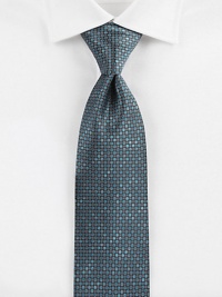 A savvy, sophisticated look woven in Italian silk, with a geometric pattern detail.SilkDry cleanMade in Italy A savvy, sophisticated look woven in Italian silk, with a geometric pattern detail.SilkDry cleanMade in Italy