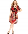 Wow them at work in Elementz' short sleeve plus size dress, broadcasting a vivid print.
