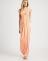 Empire waist and allover shirring add effortless elegance to this strapless jersey maxi dress. StraplessFront keyhole detailEmpire waistAllover shirringAbout 42 from natural waist92% modal/8% spandexDry cleanMade in USAModel shown is 5'10 (177cm) wearing US size Small.