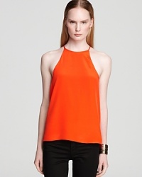 A wardrobe essential, this versatile Tibi halter top is rendered in sumptuous silk for everyday luxe. Perfect with your workday separates, or partnered with jeans and a textured jacket for easy weekend style. A wardrobe essential, this versatile Tibi halter top is rendered in sumptuous silk for everyday luxe. Perfect with your workday separates, or partnered with jeans and a textured jacket for easy weekend style.