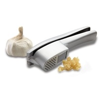This two-in-one tool allows you to press or slice garlic depending upon which chamber is chosen. The slicing chamber creates eight perfectly thin 1/16-inch slices of garlic. Use the cleaning attachment or place in the dishwasher for easy cleaning. This two-in-one tool allows you to press or slice garlic depending upon which chamber is chosen. The slicing chamber creates eight perfectly thin 1/16-inch slices of garlic. Use the cleaning attachment or place in the dishwasher for easy cleaning.