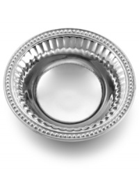 Bring dips and small snacks to the table with this handsome and versatile bowl. One of Wilton Armetale Company's most classic designs, based off a popular candlestick pattern from the early 1800's, the Flutes and Pearls collection brings the class of a bygone era to your table. Bring dips and small snacks to the table with this handsome and versatile bowl. One of Wilton Armetale Company's most classic designs, based off a popular candlestick pattern from the early 1800's, the Flutes and Pearls collection brings the class of a bygone era to your table.
