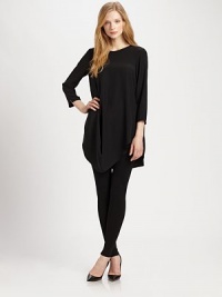 Matte silk meets a swing top offering elegant movement, a relaxed fit and an eye-catching hem.BoatneckThree-quarter sleevesRelaxed fitFashion-forward hemConcealed back zipperAbout 27 from shoulder to hemSilkDry cleanImported Model shown is 5'9½ (176cm) wearing US size Small. Matte silk meets a swing top offering elegant movement, a relaxed fit and an eye-catching hem.BoatneckThree-quarter sleevesRelaxed fitFashion-forward hemConcealed back zipperAbout 27 from shoulder to hemSilkDry cleanImported Model shown is 5'9½ (176cm) wearing US size Small.