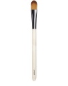 A small flat brush designed for precise application and blending of concealer. Made of synthetic materials. Made in USA.