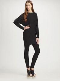 Lightweight boatneck with a touch of cashmere, sultry open back and long dolman sleeves. BoatneckLong dolman sleevesOpen back with tie detail40% rayon/30% nylon/25% polyester/5% cashmereDry cleanImportedModel shown is 5'11 (180cm) wearing US size Small. Lightweight boatneck with a touch of cashmere, sultry open back and long dolman sleeves. BoatneckLong dolman sleevesOpen back with tie detail40% rayon/30% nylon/25% polyester/5% cashmereDry cleanImportedModel shown is 5'11 (180cm) wearing US size Small.