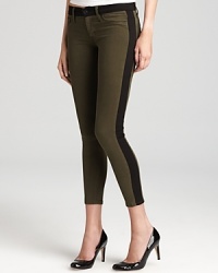 Streamline your silhouette in these striking new Hudson jeans--inspired by a tuxedo pant with classic side stripes, these sought-after skinnies add color and fall flair to your denim collection. Streamline your silhouette in these striking new Hudson jeans--inspired by a tuxedo pant with classic side stripes, these sought-after skinnies add color and fall flair to your denim collection.